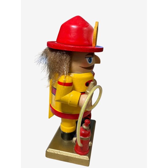 Wooden Fireman Nutcracker with Hose Fire Extinguisher and toy Fire Truck - Picture 3 of 10
